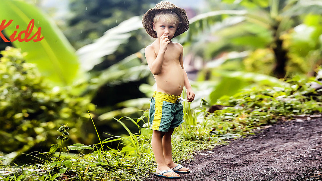 Kids enjoying the beach in Surfcuz quick-dry swim trunks
