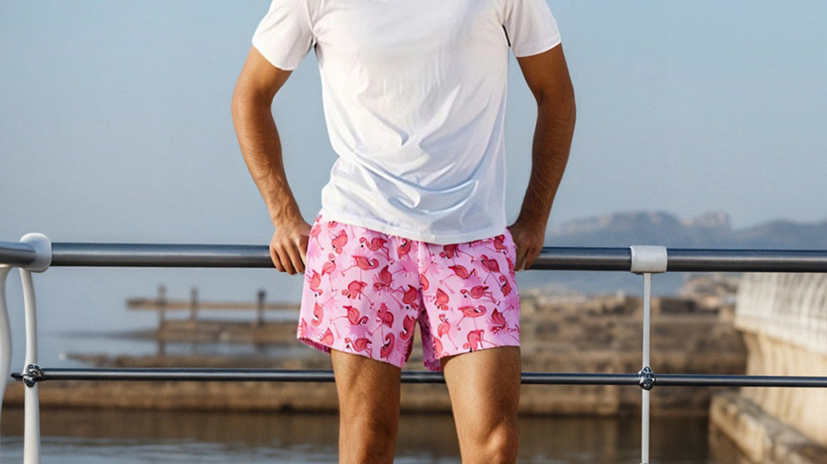 Men wearing Surfcuz 4.5-inch 2-in-1 swim shorts on the beach