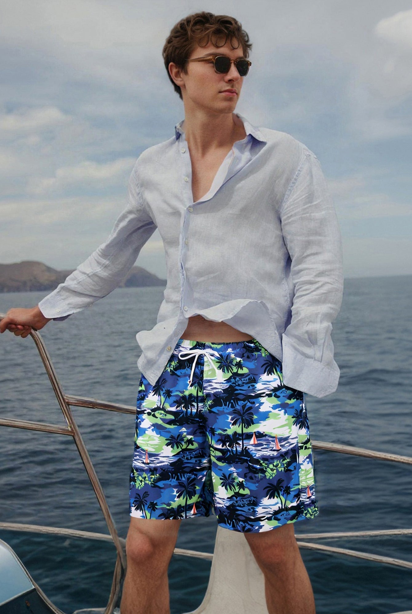 Men wearing 7 inch 2 in 1 swim shorts walking from beach to water