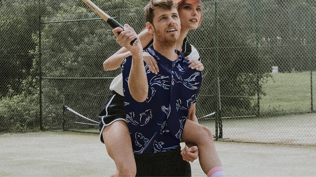 Golfer wearing a breathable men's athletic polo shirt on a sunny golf course
