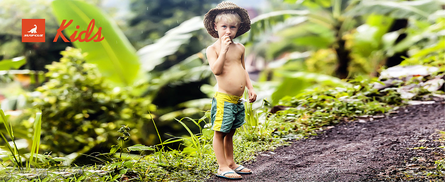 Kids enjoying the beach in Surfcuz quick-dry swim trunks